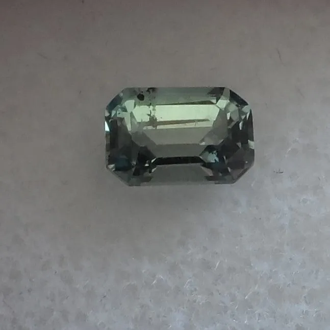 1.11 CTS GORGEOUS LIGHT GREEN COLOR EMERALD CUT MONTANA SAPPHIRE