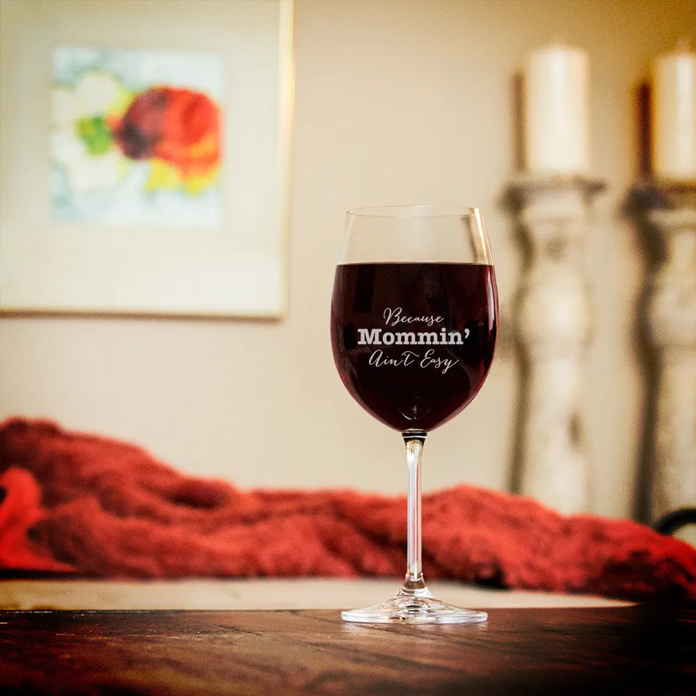 Because Mommin' Ain't Easy Wine Glass