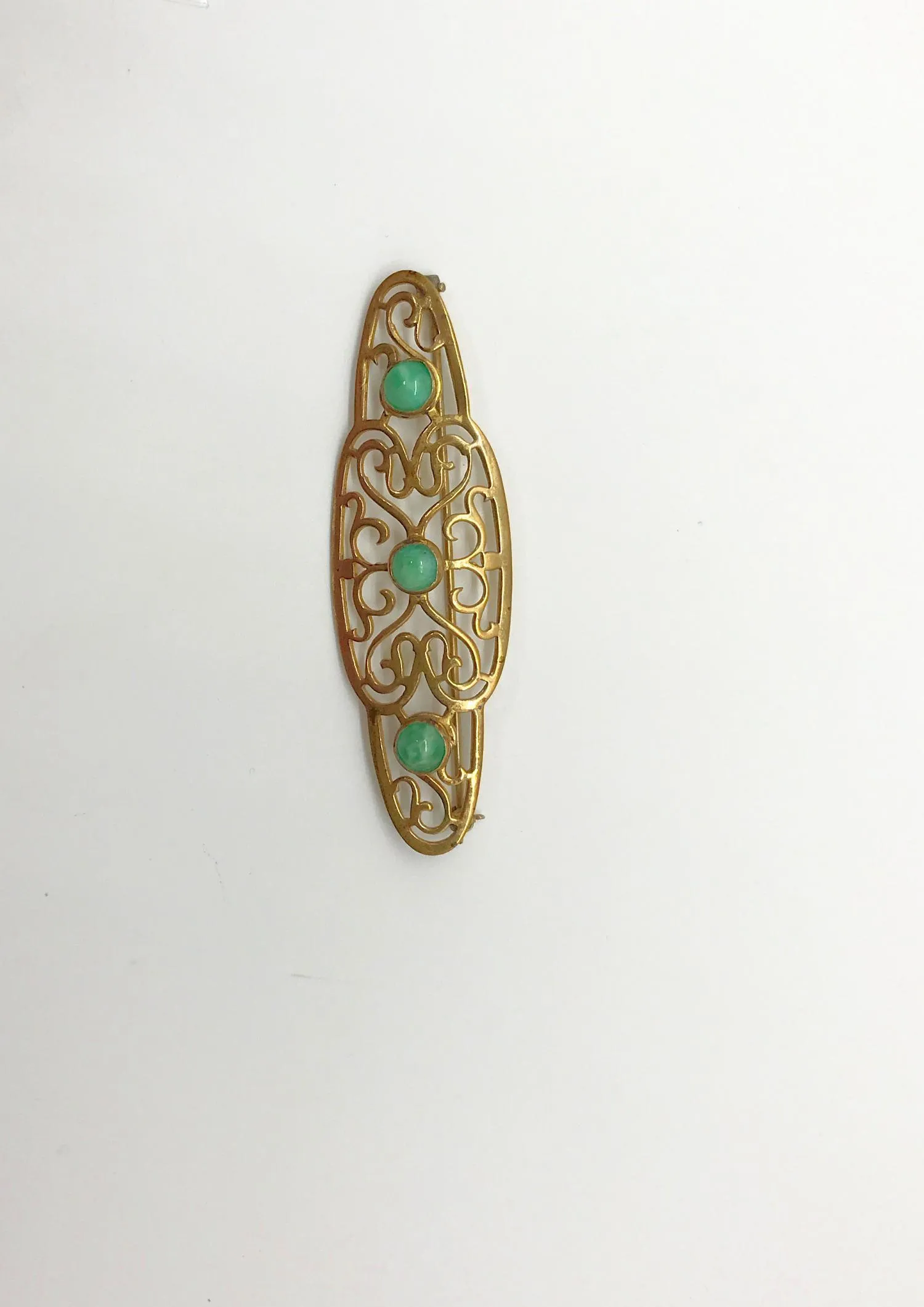 Elegant 1920s Art Deco Brooch with Green Stones