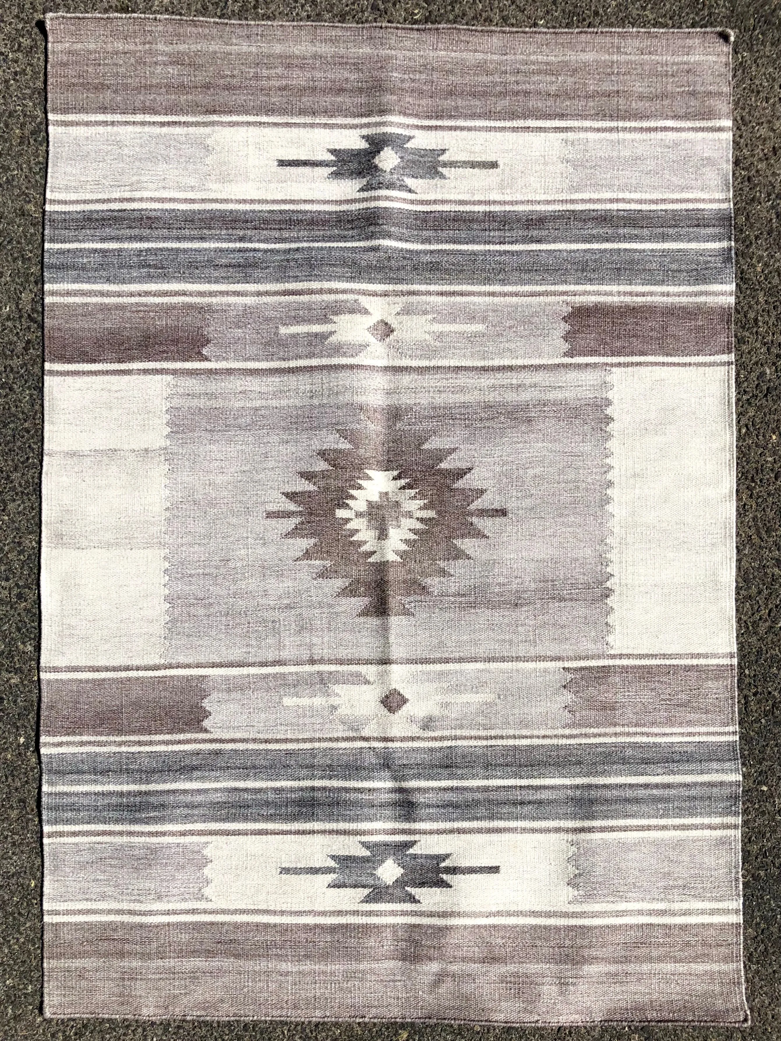 Handwoven rug made from recycled water bottles  #2000-01