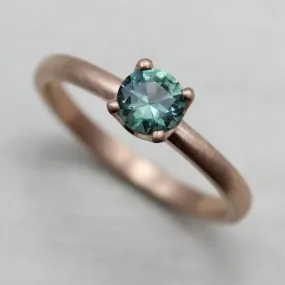 Teal Blue Sapphire and Rose Gold Crown Solitaire